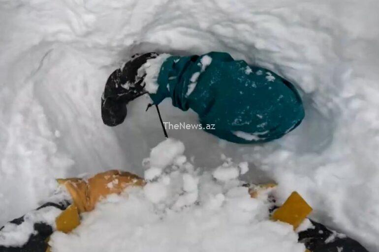 a-snowboarder-got-buried-upside-down-in-snow-see-skier’s-quick-reaction.